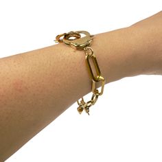 Introducing the **Love Bond Handcuff Chain Bracelet**—a bold, edgy piece that combines style with a hint of playful mischief. Made from tarnish-resistant stainless steel and available in 18K yellow gold or white gold plating, this bracelet features two fully functional handcuff clasps and dual lobster claws, making it adjustable to fit any wrist. Whether worn as a symbol of connection with your partner or as a statement on its own. You can attach your favorite charms, or one of ours, to the hand Handcuff Bracelet, Halo Jewelry, Hand Cuff Bracelet, September Birthstone Jewelry, August Birthstone Jewelry, July Birthstone Jewelry, Lobster Claws, Pearl Jewellery Earrings, Jewelry Ring Box