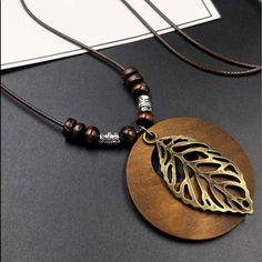 Color: Brown Material: Wood Style: Vacation, Summer, Fashionable Wooden Owl, Womens Chokers, Wooden Necklace, Circle Pendant Necklace, Beaded Pendant Necklace, Wood Necklace, Leaf Charms, Leaf Necklace, Ethnic Style