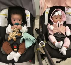 two babies in strollers sitting next to each other