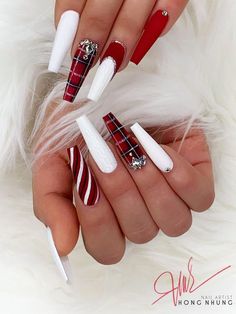 Cute Christmas red nails with red and black plaid nail, white nails, and candy nail! #redchristmasnails #christmasnails #christmasnailart #christmasnaildesigns #rednails Candy Canes, Cute Acrylic Nails, Nail Inspiration