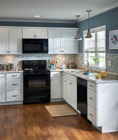 the kitchen is clean and ready for us to use in its new owner's home