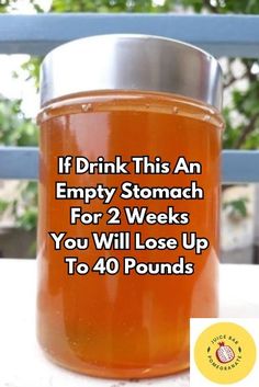 a jar filled with liquid sitting on top of a table