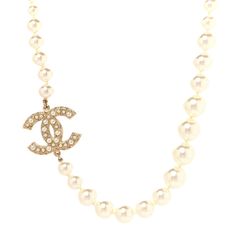 This is an authentic CHANEL Pearl CC 100th Anniversary Necklace in Light Gold. This stylish necklace is just below the collar and crafted of resin pearls in graduated size and features a gold Chanel CC encrusted logos with tiny resin pearls and clear crystals. Chanel Dainty Necklace, Chanel Classic Pearl Necklace, Chanel Pearl Chocker, White Chanel Necklace, Gold Chanel, Chanel Pearls, Anniversary Necklace, Stylish Necklace, Clear Crystal