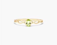 14K Yellow Gold Infinity Peridot Birthstone Ring. The birthstone of August, peridot is known for its distinctive light green color and is said to bring strength, joy, prosperity, and good health to those who wear it. It is also known to bring harmony to romantic relationships and protect against evil, jealousy and even bad dreams. This delicate infinity ring is the perfect piece for your special someone Peridot Birthstone Ring, Peridot Birthstone, Light Green Color, Jewelry Diamonds, Jewelry Photoshoot, Bad Dreams, Infinity Ring, Peridot Ring, Diamond Settings