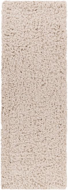 an area rug with white and beige colors on the bottom, light brown in the middle