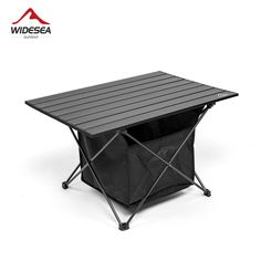 an outdoor table that is on wheels and has a black cover over the top for storage