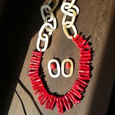 From Bottom To Top This Necklace Is 19 Inches Long. The Coral Pieces Are 2 Inch. This Is Not A Dainty Piece.It Slips Over The Head So It Has No Clasp. And It Has Matching Earings! The Chain Links Are Multi Colored. I Showed This In The Last 2 Pictures Of The Earings. I Flipped Them On Both Sides So You Can See The Colors(Although They're Kind Of Similar, It Looks Gorgeous In The Sun!) And It's The Same On The Necklace As Well. This Is An Extremely Unique Set That You Will Adore. Bundle It With S Red Coral Necklace, Coral Necklace, Chain Links, The Coral, Red Coral, Something Else, Multi Colored, The Head, Lady In Red