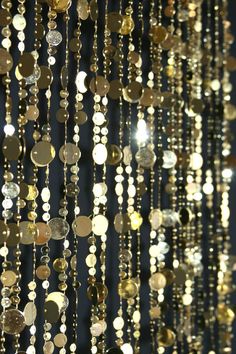 an abstract image of gold and black sequins