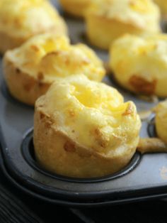 mini cheese muffins on a baking tray ready to be baked in the oven