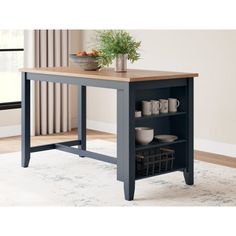 a kitchen island with two shelves on each side and a potted plant on top