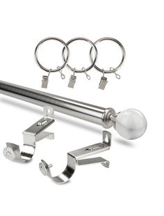 an assortment of metal objects including rings and hooks on a white background with clippings