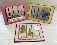 three greeting cards with trees on them and the words congratulations written in pink, green, purple