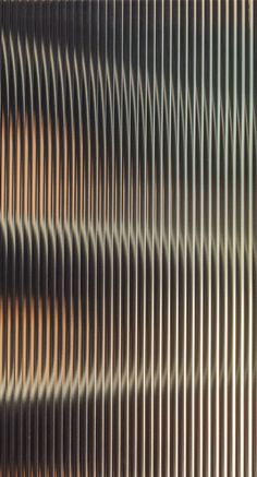 an abstract image of wavy lines in brown and blue