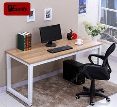 an office desk with a computer on it and a chair in front of the desk