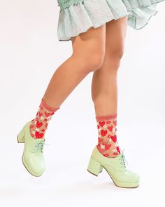 Heart-shaped pink and red strawberries interspersed with playful daisies make these strawberry socks the perfect addition to your Valentine's Day, Spring, and Summer outfits. Set against white sheer fabric for maximum color pop with a ruffle cuff for ultra sweetness. NOW AVAILABLE IN 2 SIZES (please select your size from the dropdown below): Size I - Fits US W5.5-10 Size II - Fits US W10.5-14/US M8.5-12 For size 5 or below, try kids size. 200 Needle Count. ✨ Funky yet elegant - no silly or child Strawberry Socks, Pretty Socks, Spring And Summer Outfits, Ruffled Socks, Sheer Socks, Red Strawberry, Best Candy, Strawberry Print, Crew Sock