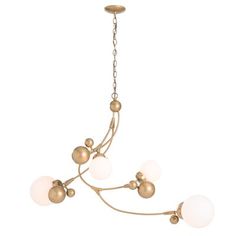 a chandelier with five lights hanging from it's sides and four balls on each end