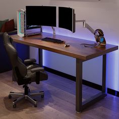 a computer desk with two monitors and a keyboard