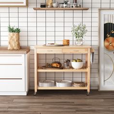 A clean kitchen makes for a clear mind. Add a modern natural touch to your living space with this classic 3-tier rolling kitchen trolley cart from HOMCOM. Featuring a slatted upper shelf and a solid wood lower shelf and 2 spacious drawers, this 3 tier kitchen rolling cart offers ample storage for a variety of items and utensils. 4 smooth rolling casters with 2 locking brakes make this cart super simple to move and relocate throughout the kitchen or house. Tiny Kitchen Ideas Apartments, Kitchen Cart Ideas, Movable Kitchen Island, Kitchen Cart Island, Butcher Block Kitchen Cart, Modest Kitchen, Forest Library, Workbench With Storage, Rolling Island