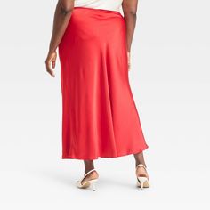 Dress up for brunches, lunches or dinners in chic style with this Maxi Slip Skirt from A New Day™. This maxi-length slip skirt is made from lightweight satin fabric for all-day comfort, while the full elastic waistband lends a secure fit. Tailored in a high-rise silhouette with a slim fit for a flattering look, you can pair this skirt with your fave tops and footwear for versatile ensembles. A New Day™: Style that goes wherever you do. Chic Red Silk Bottoms, Red Satin Summer Bottoms, Red Satin Bottoms For Summer, Red Satin Bottoms, Solid Color Long Skirt For Brunch, Solid Satin Maxi Skirt For Summer, Solid Long Skirt For Brunch, Elegant Red Maxi Skirt For Night Out, Spring Date Night Satin Skirt