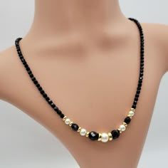 Classic Black Crystal Bead Necklace with Faux Pearls and Gold Spacer Beads Condition: Excellent condition. Please see the pictures attached. Materials: beads, faux pearls, gold tone spacers.  Closure: lobster claw Size: 19 inches Maker Signature: none. Please note that due to differences in screen settings, colors may differ slightly between photos and the physical product. If you have any questions, please do not hesitate to contact me. Thank you for your visit! Crystal Bead Necklace Diy, Black Crystal Necklace, Diy Pearl Necklace, Wooden Bangle Bracelet, Necklace With Pearls, Pearl Beading, Diy Jewelry Necklace, Beaded Necklace Diy, Black Beaded Jewelry