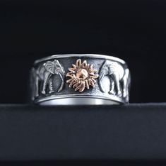 Strength & Power: In the most general, universal meaning, the elephant symbolizes strength and power. This meaning refers to both the body and the mind. ... Elephants are gentle giants, who show great care toward their herd, offspring and elders. This symbolizes responsibility, determination and loyalty. This ring is made of sterling silver and as an option combined with the 14K solid gold sun.  Option all silver is also available (please select " All silver" or "S. Silver + Gold sun" option if Elephant Hair Ring Gold, Elephant Design Gold Jewellery, Elephant Rings Silver, Gold Elephant Bracelet, Metalwork Jewelry Elephant, Elephant Ring, Elephant Jewelry, Friendship Rings, Gold Sun