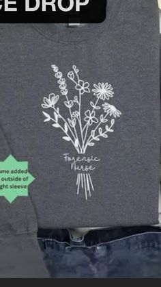 a t - shirt that has flowers on it and the words teenage drop written in green