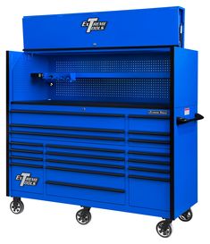 a blue tool cabinet on wheels with the top open to show tools in it's drawer