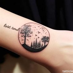 a person with a tattoo on their arm that says, best soul in the forest