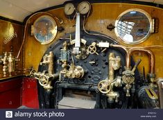 an old fashioned steam engine with gauges and valves