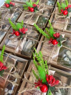 many small boxes with christmas decorations in them