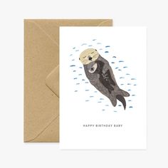 a card with an image of a seal wearing a hat