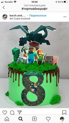 an image of a birthday cake made to look like minecraft with the number 8 on it