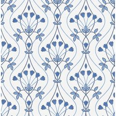 a blue and white wallpaper pattern with flowers on the side, as well as leaves