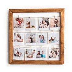 a wooden frame with photos hanging on clothes pins