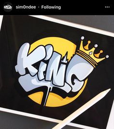 a sticker that says king with a crown on it