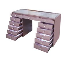 a pink desk with drawers on it and a glass top drawer in the bottom right corner