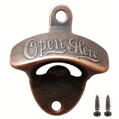 an open here bottle opener with screws on it