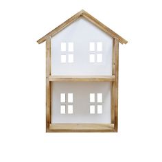 a wooden doll house with four windows on the front and two levels above it, against a white background