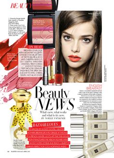 a magazine page with lipstick and cosmetics on the pages, including an ad for beauty veils