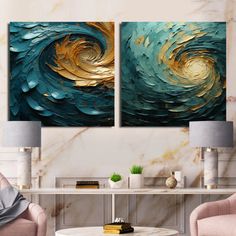 two paintings on the wall in a living room