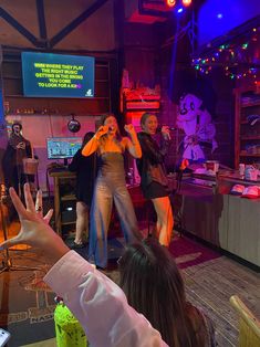 Two pub crawl guests singing karaoke! Karaoke Bar Aesthetic Friends, Karaoke Friends Aesthetic, Music Friends Aesthetic, House Show Aesthetic, Karaoke Photoshoot, In And Out Aesthetic, College Bar Aesthetic, College Fun Aesthetic, Karaoke Bar Aesthetic