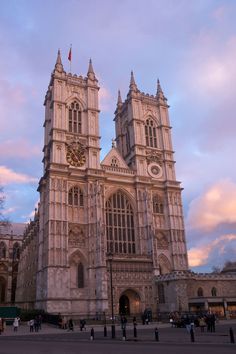 the large cathedral has two clocks on it's front and side towers that are pointed upward