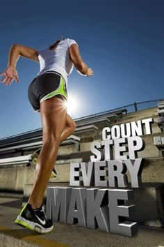 a woman running down the road in front of a sign that says count step every make