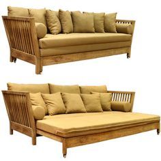 two wooden couches with pillows on them, one in beige and the other in tan