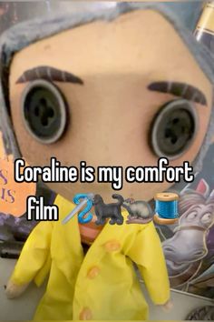 someone is saying coraline is my comfort film 2c with an image of a stuffed animal in the background