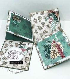 three christmas cards with pine cones on them