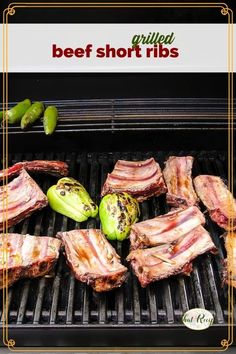 grilled beef short ribs on the grill with peppers and jalapenos next to it