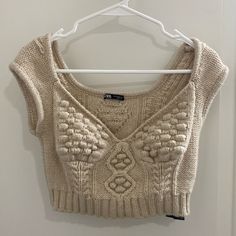 Beige Zara Cropped Sweater Size Medium Like New Never Worn Trendy Beige Cable Knit Top, Fitted Cable Knit Cropped Tops, Fitted Knit Crop Top In Beige, Fitted Knit Beige Crop Top, Fitted Knitted Beige Tops, Fitted Beige Knitted Tops, Fitted Beige Zara Crop Top, Cream Fitted Cable Knit Top, Fitted Cream Cable Knit Top