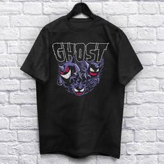 Gotta haunt them all 🤘Get the gift they'll love ♁ ---SHIRT INFORMATION--- * Unisex tee great for men and women. * 100% ringspun cotton, it rocks. * Tear-away label because you don't want that anyways, pre-washed to minimize shrinkage. * High-quality, soft fabric. Feels like being a rock star. --SIZING-- Please refer to the last photo to check the size chart when selecting your size. Women's Fit shirts can be very tight fitting, please go up a size or choose unisex if you are unsure. --SHIPPING- Black T-shirt For Halloween And Fan Conventions, Black Pre-shrunk Shirt For Fan Conventions, Black T-shirt For Halloween Fan Conventions, Graphic Tee For Halloween And Fan Conventions, Spooky Graphic Print T-shirt For Streetwear, Halloween Fan Apparel Short Sleeve T-shirt, Halloween Streetwear Shirt With Sublimation Print, Horror Graphic Print Short Sleeve Shirt, Halloween Streetwear Shirt With Front Print