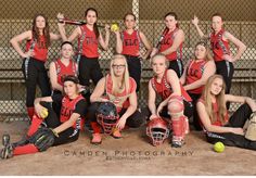 the softball team is posing for a photo